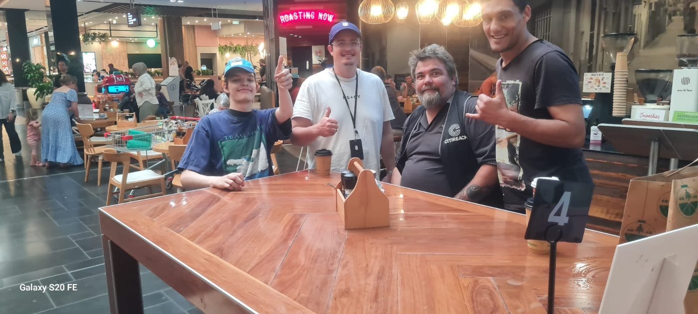 The CitiSkills team catching up over coffee at a local cafe
