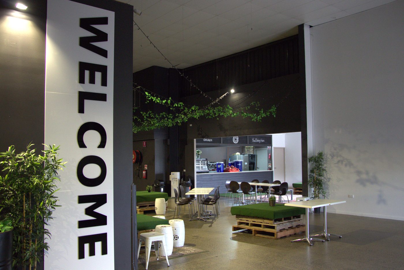 A welcoming community space with a Welcome sign at Citipointe